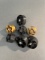 Seven revolver speed loaders.