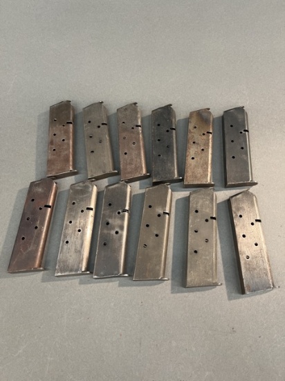 Twelve 1911 45ACP magazines.