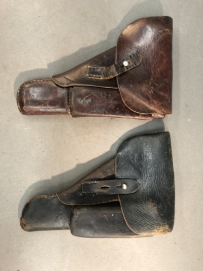 2 Browning Hi Power pistol leather holsters.