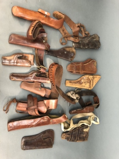 14 assorted revolver leather holsters