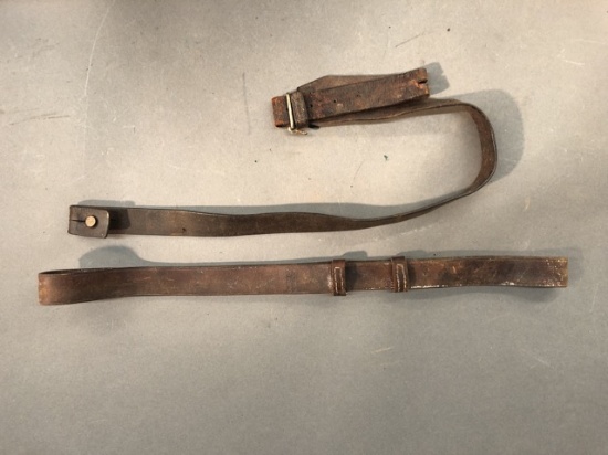 3 Military rifle slings and two belts.