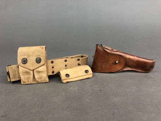 WW2 U.S. M1911 pistol holster, magazine pouch, first aid pouch, and M1936 webbing belt