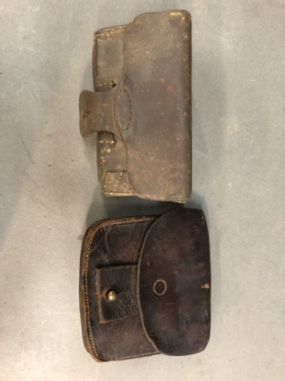Leather shot bag and cartridge box.