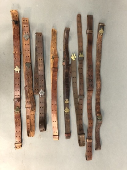 8 U.S. M1907 and military style leather slings.