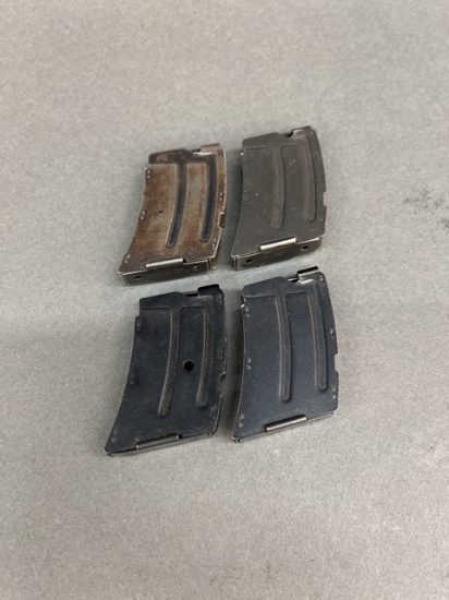 Four Remington magazines.