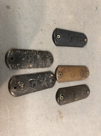 Group of grips for Colt 1900/1902 pistols