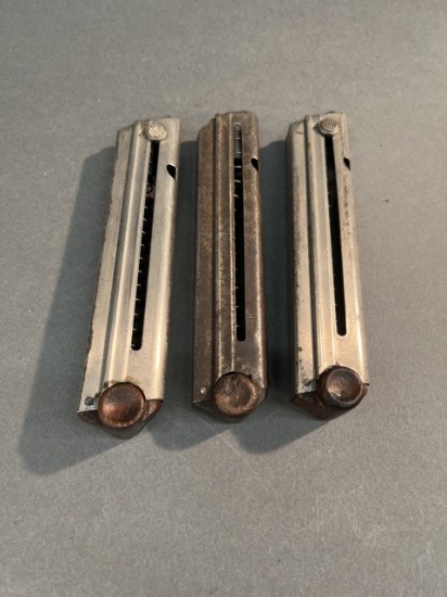 Three P08 Luger magazines.