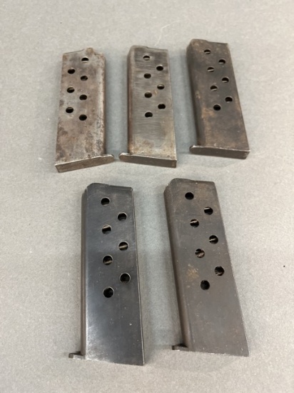 Five Astra 400 magazines.