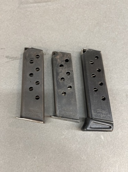 Three Walther 32 caliber magazines.