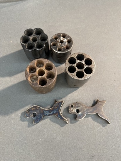 Six Revolver parts.