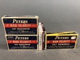 Two boxes of 243 Winchester and two boxes of 257 Roberts
