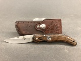 colt folding pocket knife with leather sheath