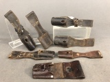 Group of seven leather bayonet frogs