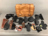 15 holsters, shooting bag, and 2 S&W grips.