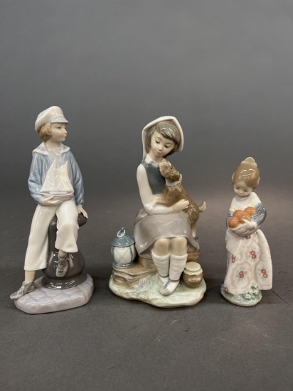 3 Lladro figures.