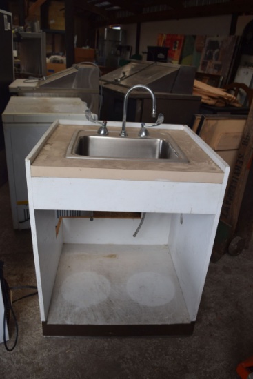 single bay sink with wood cabinet