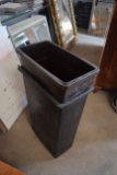 2 rubbermaid trashcans