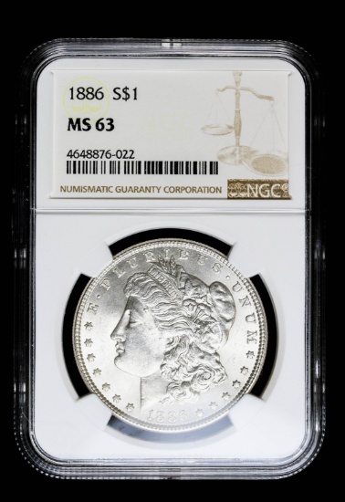 1886 SILVER MORGAN DOLLAR COIN NGC MS63