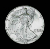 1987 1oz .999 FINE AMERICAN SILVER EAGLE COIN