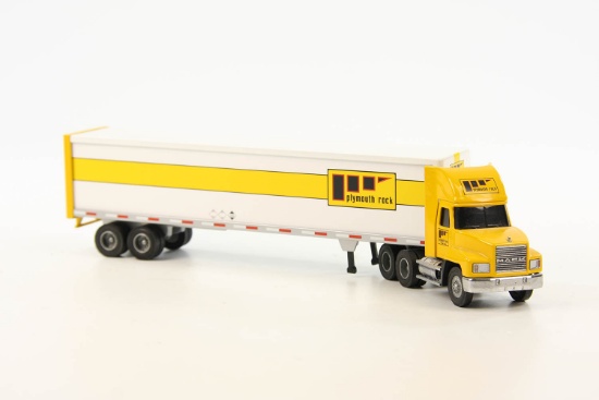 Mack 3-Axle Tractor w/Plymouth Rack Trailer - 1:64