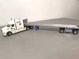 Peterbilt Tractor w/East Flatbed - Maxim Crane