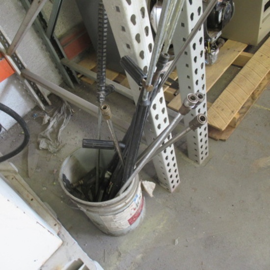 bucket of pressure washer wands