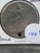 1873-CC Trade Dollar Holed
