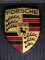 Porsche crest.