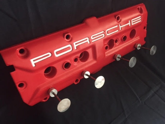 Porsche 928 rocker-cover coat hanger.