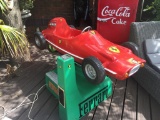 Child's arcade ride in the form of a 60's Ferrari