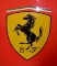 Ferrari lacquered sign.