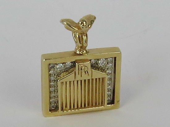 14 carat gold Rolls Royce pendant.