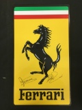 Signed Ferrari metal garage sign.