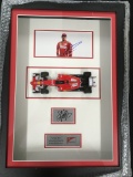 Ferrari presentation signed by Raikkonen and Vettel and a signed 'Ferrari 70' flag.