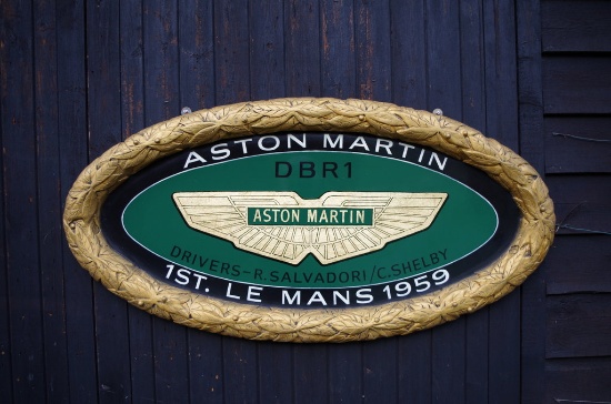 Aston Martin oval wall sign.