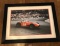 Sir Stirling Moss OBE framed photograph.