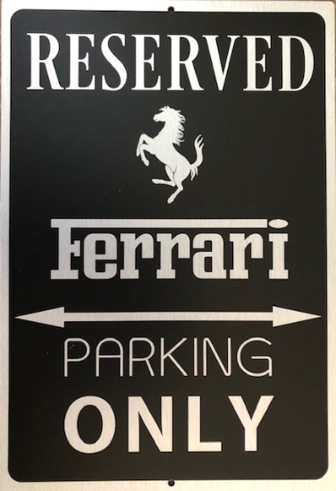 Reserved Ferrari parking only sign