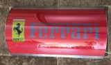 Illuminated wall sign bearing Ferrari logo on Rosso ground
