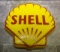 An illuminated Shell Oil wall sign