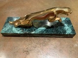 Large leaping Jaguar in gold coloured finish on marble base