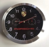 A fine circular Porsche-themed wall clock