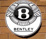 Contemporary illuminated Bentley-themed circular wall sign