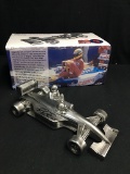 Chrome 'Taxi for Senna' sculpture, signed by Nigel Mansell CBE