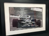 Williams FW11 photograph, signed by Nigel Mansell CBE