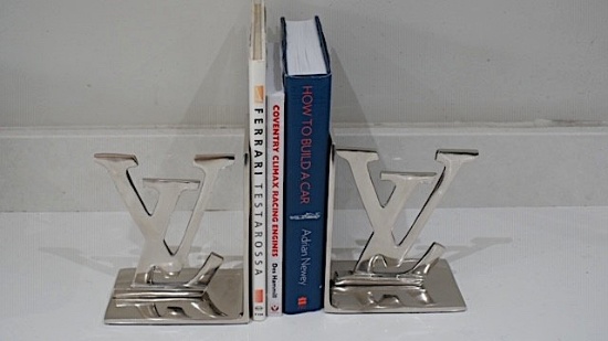 A pair of Louis Vuitton inspired book ends