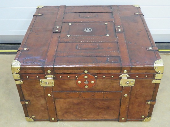 A large and impressive vintage leather square trunk