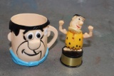 Vtg. 1960's Hanna Barbera Fred Flintstone Mug and Push Button Puppet Toy