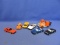 7 Vintage Bandai Transformers 3” Cars - ©  1984: Red Ferari, Black Mercedes, Orange Porche, Police C