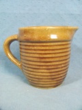 Brown Pottery Pitcher – Marked USA on Bottom – Ribbed Design – 4 ½” tall and 4” diameter