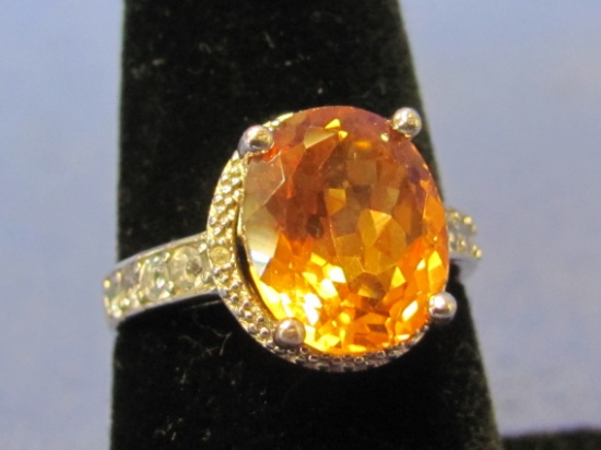 Sterling Silver Ring – Orange Oval Stone – 8 Small Tanzanite – Size 7 – Weight is 3.5 grams – New w